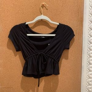 Women’s black tie top.